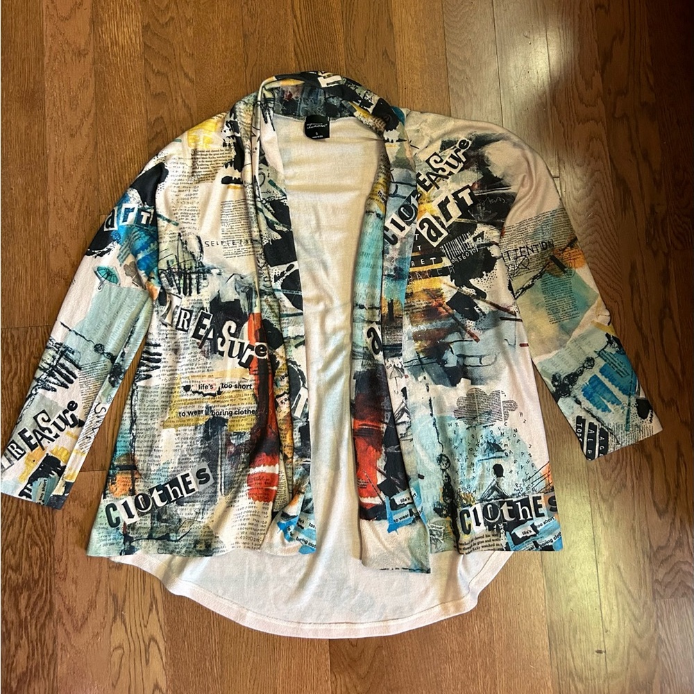 INOAH wearable art cardigan. Cool designs with “newspaper” style art.  Small